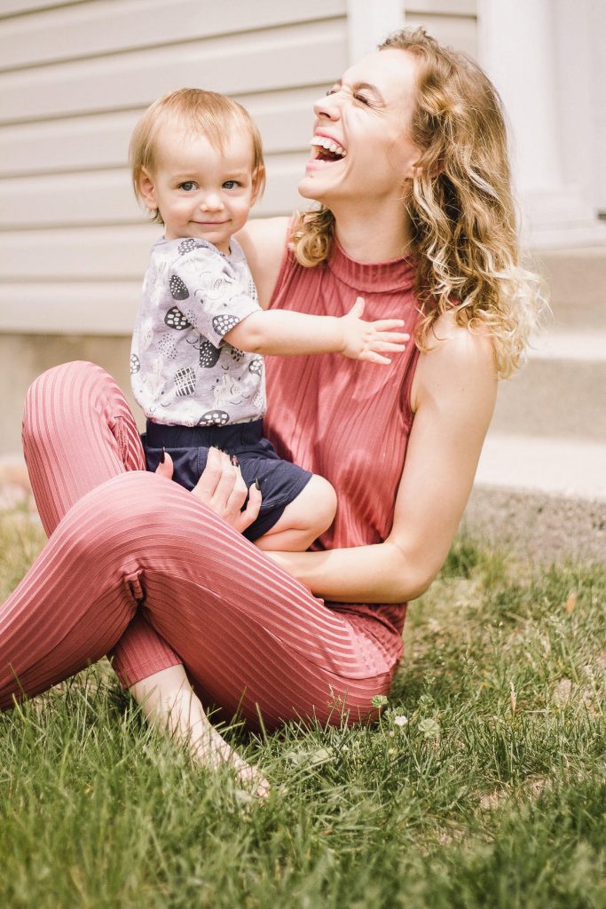 mom and baby laughing